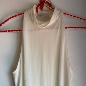 Turtle Neck White No Sleeve Shirt